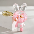 Detail of bunny acrylic keychain with pink beads, gold ring and Lucky text engraving - Rabbit Style / Pink