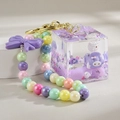 Cute purple liquid quicksand bottle keychain with pig car and gradient pearl chain - Chain Style / Purple