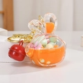 Orange rabbit liquid quicksand keychain with colorful beads and a red bell charm - Orange Rabbit Head