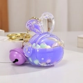 Cute purple bunny liquid keychain with colorful beads and a golden bell charm - Purple Rabbit Head