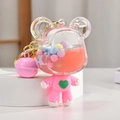 Pink bear keychain with floating colorful beads in liquid and pink bell accessory - Pink Bear