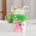 Creative pink and green bear-shaped quicksand keychain with colorful beads and bell - Green Bear