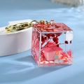 Macro shot of liquid glitter cube keychain with pink house and gold metal ring - Light Gold Buckle + Square Bottle House / Rose Red