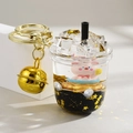 Porte-clés cochon rose mignon avec sable mouvant liquide et cloche dorée - Style Cloche Iceberg