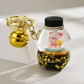Porte-clés cochon rose flottant avec sable mouvant noir et paillettes dorées - Style Cloche Bouteille de Soda