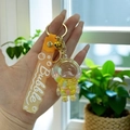 Portachiavi astronauta giallo con glitter liquidi e cinturino in silicone giallo - Astronauta Giallo Limone