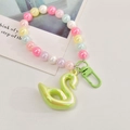 Close-up of holographic swan pendant with colorful macaron beaded strap and metal clasp - Buckle Chain With Swan / Green