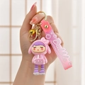 Pink cartoon girl keychain with soft PVC strap, golden bell and bubble lettering charm - Gradient Strap + Girl + Bell / Pink