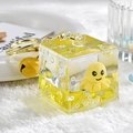 Porte-clés poulpe liquide jaune avec paillettes, anneau doré et cloche sur peluche blanche - Jaune Citron