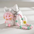 Cute pink and white acrylic bunny keychain with shaker pearls and beaded strap detail - Chain Style / Pink