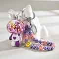 Purple acrylic rabbit keychain featuring liquid oil pearls and a beaded lucky strap - Chain Style / Purple