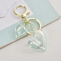 Detalle de colgantes de acrílico iridiscente en forma de corazón con llavero de oro - Hebilla de oro claro + Doble corazón / Azul Cielo