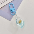 Luminous acrylic seashell keychain with blue lobster clasp and real embedded shell - Sky Blue