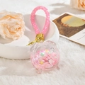 Pink astronaut keychain with liquid glitter sand in a clear clock-shaped pendant - Alarm Clock Cord Pink