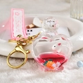 Pink heart liquid acrylic keychain with white bunny and Sakura wristlet strap - Pink Rabbit Perfume Bottle / Pink
