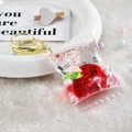 Pink pig liquid quicksand keychain in candy-shaped acrylic with gold clasp - Red Rabbit Pillow / Red