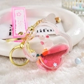 Cloud-shaped liquid keychain with pink sand, white bunny, and colorful sequins - Pink Rabbit Four-leaf Clover / Pink