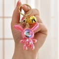 Pink metallic astronaut space rabbit keychain with golden bell and starry globe visor - Rose Red (Bell Style)