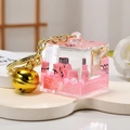 Portachiavi escavatore rosa con sabbie mobili campanello dorato e glitter liquidi - Rosa