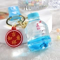 Blue acrylic liquid keychain featuring a cute rabbit in an oil bottle with a hand strap - Bunny Soda Bottle / Blue