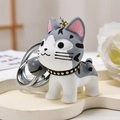 Dettaglio del portachiavi a forma di gatto a strisce bianche e grigie con campanellino - Gatto a strisce grigie e bianche (Chiusura girevole argento + Campanello) / Grigio