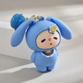 Light blue silicone rabbit keychain with yellow star and blue bell on a gray background - Blue Bell Style