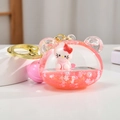 Dettaglio di un portachiavi a sabbie mobili liquide con Hello Kitty e stelle lucide - Testa di Orso Gatto Cartone Animato