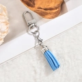 Detail view of sky blue leather tassel keychain with silver metal clasp and ring - D-Clasp Mini Tassel / Blue
