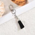 Detail shot of black faux suede tassel pendant with silver metal lobster clasp and ring - D-Clasp Mini Tassel / Black