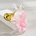 Leuchtender rosa Kaninchen-Schlüsselanhänger mit goldener Glocke und Glitzersternen - Rosa (Leuchtender Hase Glocke)