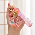 Whale liquid keychain with pink glitter oil, mini figure, and pink bubble strap - Rope Style with Figure [Pink]