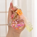 Cute whale liquid keychain with pink flowers and purple stars in a clear bubble pendant - Rope Style Flash [Lemon Yellow]