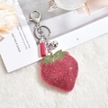 Sparkling strawberry keychain with pink rhinestones and tassel on a soft white carpet - Keychain + Rhinestone Pendant / Watermelon Red with Green Leaf (Tassel Style)