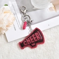 Detail of pink rhinestone megaphone keychain with CHEER lettering and soft tassel - Rose Red (Tassel Style)