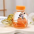Creative panda drifting bottle keychain with orange liquid and golden bell ornament - Bottle Bell Style / Orange
