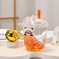 Orange panda liquid keychain featuring flowing glitter and golden bell on white display - Iceberg Cup Bell Style / Orange