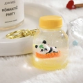 Cute panda floating bottle keychain with yellow liquid, glitter, and golden metal ring - Single Hook Bottle / Lemon Yellow