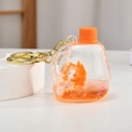 Creative orange laundry detergent bottle keychain with liquid sand and fox doll - Orange Laundry Detergent Bottle Style
