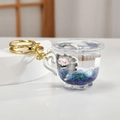 Blue liquid quicksand keychain with cute white fox figure and gold ring - Gray Tea Cup Style