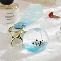 Cute panda liquid quicksand keychain with blue fluid and soft light blue silicone strap - Planet Strap Style / Blue
