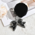 Porte-clés pompon noir chic avec un nœud en strass étincelant pour décor de sac élégant - Porte-clés+Nœud+Pompon / Noir (Bordure Blanche)