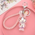 Détail du porte-clés lapin en acrylique laser avec cordelette en strass rose - Blanc (Lapin Dégradé Laser)