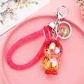 Detail of gradient pink rabbit keychain with crystal texture and pink beaded lanyard - Golden Rose Red (Laser Gradient Rabbit)