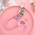 Rosa facettierter Harz-Hasen-Schlüsselanhänger mit Glitzerseil und lila Stern-Anhänger - 4-teilige Kette + Kaninchen + Seil Perlen Glocke / Rosa