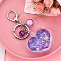 Porte-clés cœur à paillettes liquides avec clochette violette et perles roses - Violet