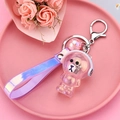Pink translucent astronaut bear keychain with laser strap and decorative sparkle ball - Glowing Bear [pink]
