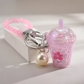 Pink glowing rabbit keychain with mini beverage cup pendant and pearl accent for bags - Glowing-in-the-dark Milk Tea Cup [purple]