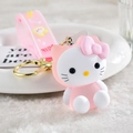 Pink and white cartoon cat silicone keychain with Milk printed wrist strap and gold ring - Glowing-through Cat [pink]