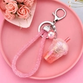 Pink glowing bunny keychain with glitter bubble tea charm and soft woven pink rope - Milk Tea Cup With Rope Design [pink]