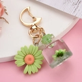 Golden moon keychain with green daisy pendant and clear miniature glass bottle charm - Moon Buckle+Bottle+Flower / Light Green